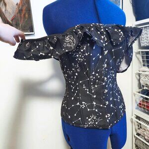 Black corset with stars and off-shoulder sleeves size 8 from Corset Story